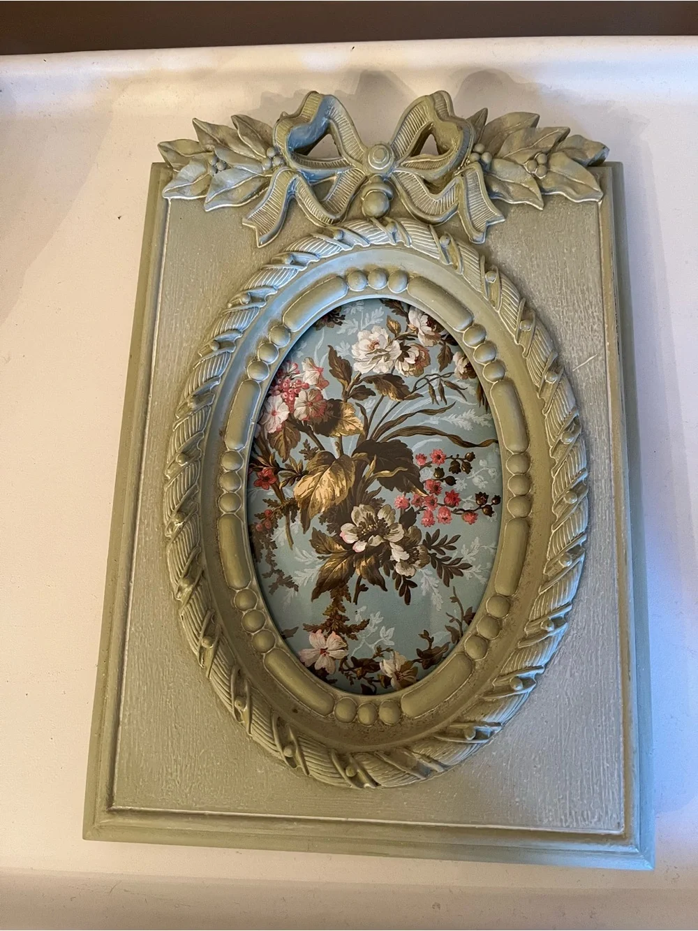Ornate Vintage-Style Sage Wall Plaque with Oval Frame